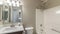 Pano Small bathroom interior with vanity sink and mirror cabinet