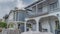 Pano Two storey homes along pathway with picturesque views of canal and cloudy sky