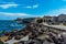 A panorama across the breakwater on Ortygia island towards the shore embankments in Syracuse, Sicily