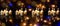 Panorama, advent season with a lot of candles, sparkling reflect