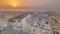 Panorama and aerial view of coastline Dubai at sunset timelapse, United Arab Emirates