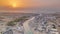 Panorama and aerial view of coastline Dubai at sunset timelapse, United Arab Emirates