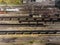 Panorama aerial view shot on railroad tracks with wagons laden Coal. Loading railway cars. Mining coal extractive