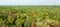Panorama, aerial view. Sunrise shines down around peat swamp forest, beautiful shaped, shadow and green canopy. Sirindhorn Peat