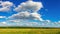 Panorama of agricultural field in summer Sunny day with clouds, Russia