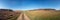 Panorama of agricultural field at sunny day