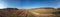 Panorama of agricultural field at sunny day