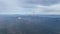 Panorama from airplane of breathtaking mountain range peaks