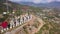 Panorama of Alanya resort city with residential complex on a summer sunny day. Clip. Aerial view of a red Turkey flags