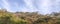 Panorama of the Alps in summer. View on the Emosson dam in Switzerland during Tour du Mont Blanc hike.