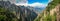 Panorama of amazing cracked rock covered with scrubby pine trees with criss crossing lines in Huang Shan China