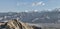 Panorama of ancient casttle on cliff among high mountains