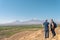 Panorama of Ararat with two male standing and looking to a valley