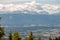 Panorama of the Austrian Alps,Europe,at Lake Ossiacher See with the mountains of the Karawanken Mountains with paragliders