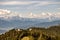 Panorama of the Austrian Alps,Europe,at Lake Ossiacher See with the mountains of the Karawanken Mountains with paragliders