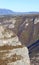 Panorama in autumn with an impressive cliff in Northern Italy