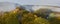 Panorama of an autumn sunrise with fog in the valley over the ruins of NovÃ½ HrÃ¡dek Castle