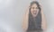 panorama banner of blurred conceptual art image of a woman grabbing her head from a headache, position behind transparent plastic
