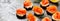 Panorama banner of fresh smoked salmon canapes