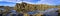 Panorama of basalt rock formations and rock pool reflections at Bombo Headland quarry, New South Wales Australia