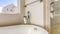 Panorama Bathtub and separated shower inside the bathroom with towel rod on the wall