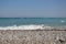 Panorama of the beach of the Aegean Sea in the village of Theologos on the island of Rhodes in Greece