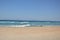 Panorama of the beach of the Aegean Sea in the village of Theologos on the island of Rhodes in Greece