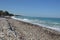 Panorama of the beach of the Aegean Sea in the village of Theologos on the island of Rhodes in Greece