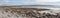Panorama with beach, Lighthouse  and cliffs of Moher in background in Inisheer island