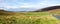 Panorama of a beautiful autumn landscape with grazing sheeps in Cairngorms national park, Scotland