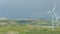 Panorama of beautiful landscape, natural environment, wind farm in green field