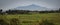 Panorama of a beautiful landscape overlooking Mount Kenya on a cloudy cloudy day