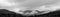 Panorama of a beautiful scenery of misty mountains