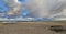 Panorama of beautiful scenic view of stormy Baltic sea, dramatic sky, sandy beach