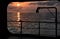 Panorama of beautiful sunset and evening clouds over the calm ocean.