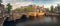 Panorama of beautifull Amsterdam canals with bridge, Holland