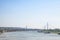 Panorama Belgrade brigdes over the Sava river Ada, Gazela, the old and the new railway bridges taken during a summer afternoon.