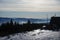 Panorama Beskid slaski . Mountain view from Skrzyczne peak in Szczyrk, Silesian region, Poland on a foggy and Sunny winter day.