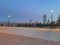 Panorama of the big city. Skyscrapers and Soviet buildings. Park recreation area.