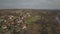 Panorama from a bird`s eye view. Central Europe: The Polish village is located among the green hills and river. Temperate climate.