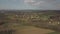 Panorama from a bird`s eye view. Central Europe: The Polish village is located among the green hills and river. Temperate climate.