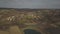 Panorama from a bird`s eye view. Central Europe: The Polish village is located among the green hills and river. Temperate climate.