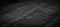 Panorama black slate background or texture