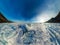 Panorama of the blue hummocks of Lake Baikal at sunset