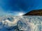 Panorama of the blue hummocks of Lake Baikal at sunset