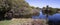 Panorama of blue lake in Big Swamp Bunbury Western Australia in spring.