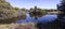 Panorama of blue lake in Big Swamp Bunbury Western Australia in spring.