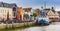 Panorama of a boat at the quayside of the old harbor in Husum