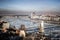Panorama of Budapest - Parliament, chain bridge, river Danube in the spring with ice drifts, Budapest, Hungary