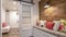 Panorama Built in banquette along the brown wood wall of a home with carpeted floor